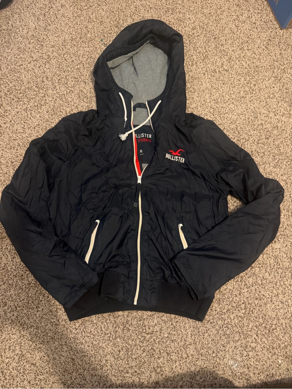 Hollister Men's Dark Navy Hooded Windbreaker with White Accents